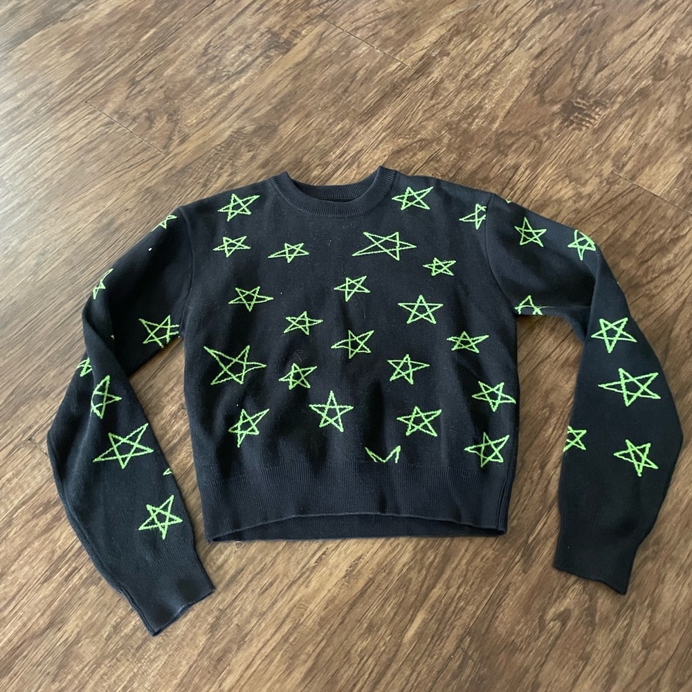 green and black star sweater